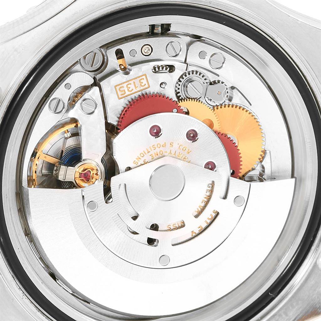 The image shows a close-up view of the Rolex Yacht-Master 116622 Men's Stainless Steel Blue Dial 116622 Men's Stainless Steel Blue Dial's internal mechanical movement parts.