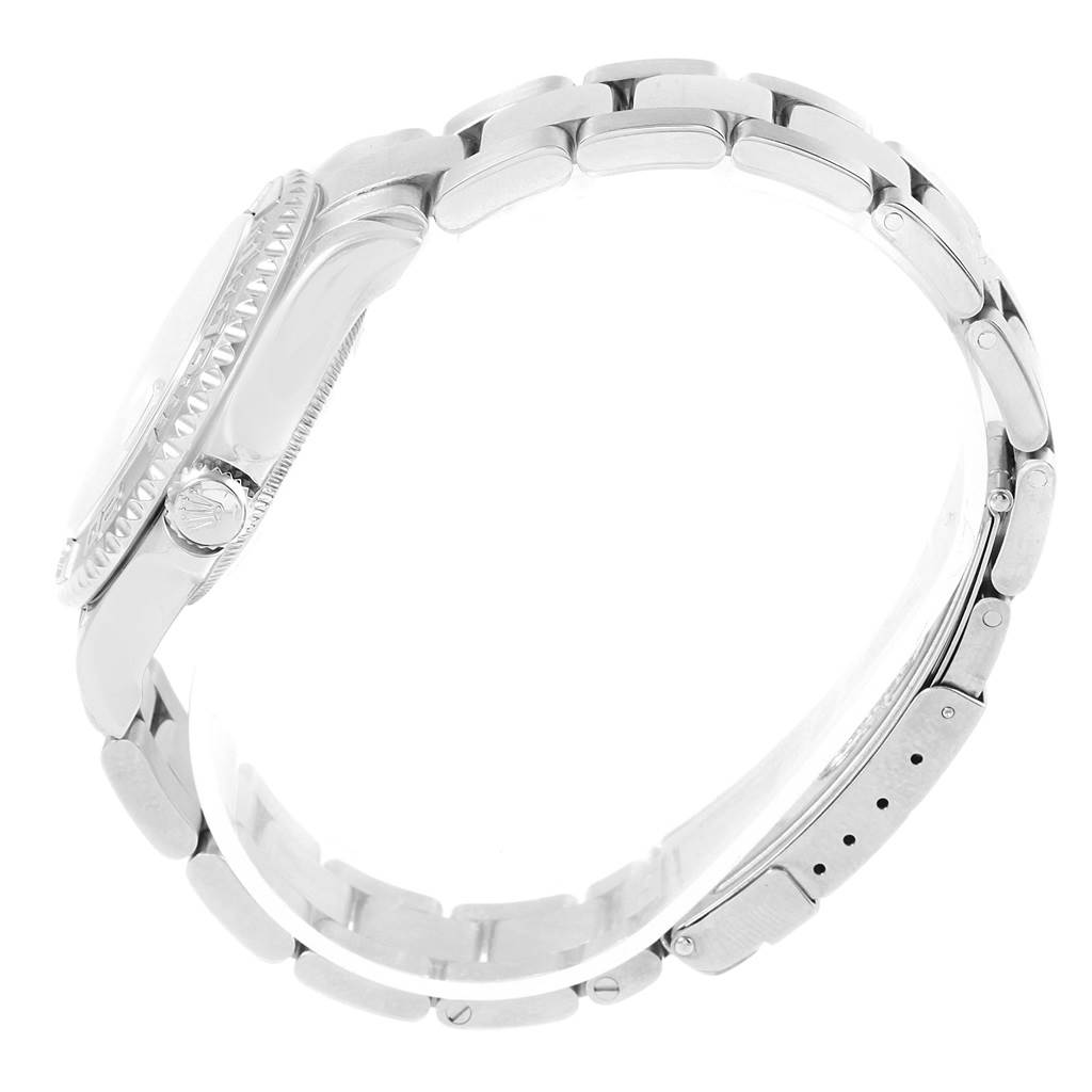 The image shows a side view of the Rolex Yacht-Master 168622 Men's Stainless Steel Silver Dial 168622 Men's Stainless Steel Silver Dial watch, highlighting its bracelet, side case, and crown.