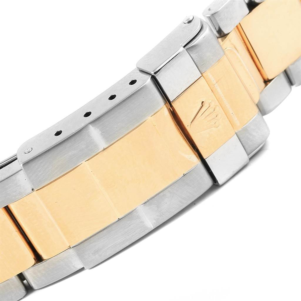 This image shows a close-up of the two-tone bracelet of a Rolex Yacht-Master 16623 Men's Stainless Steel Grey Dial 16623 Men's Stainless Steel Grey Dial watch.