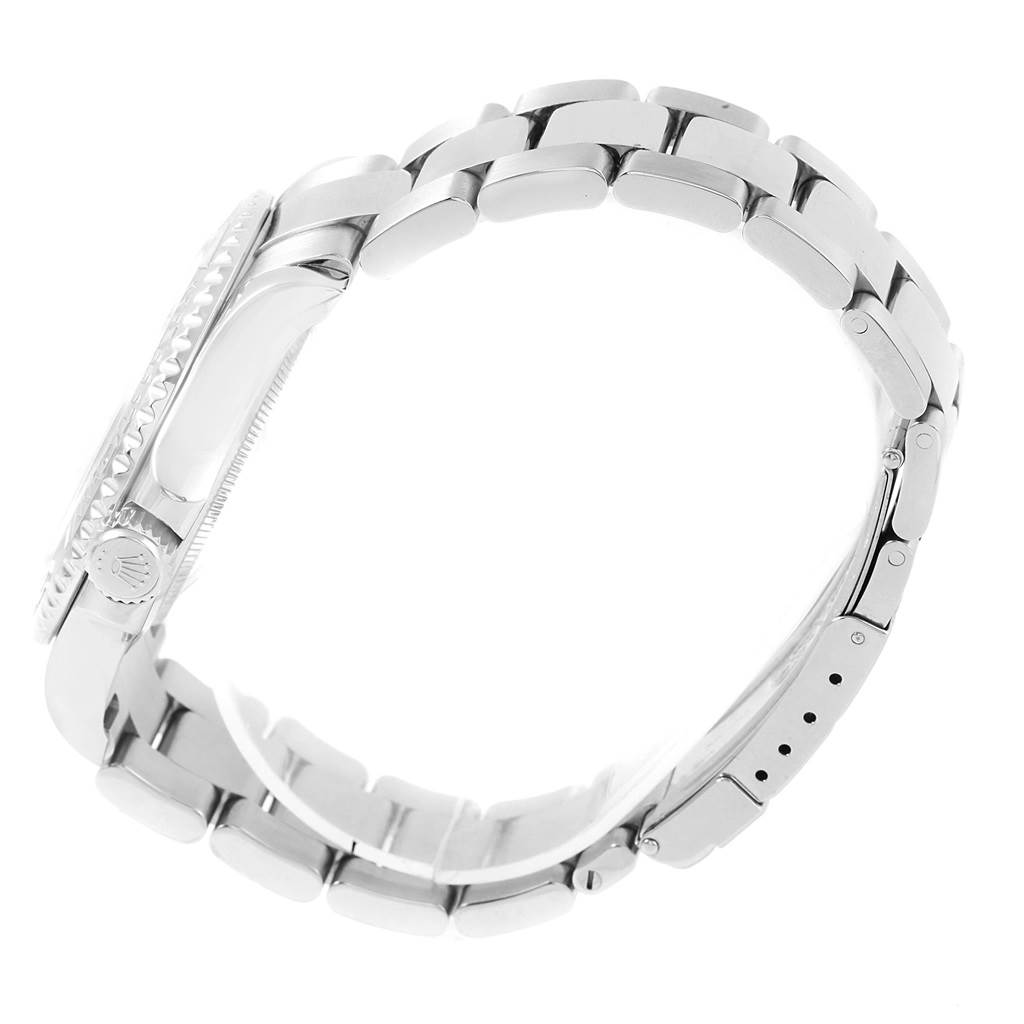 This side view image shows the bracelet, clasp, case, and crown of a Rolex Yacht-Master 16622 Men's Stainless Steel Silver Dial 16622 Men's Stainless Steel Silver Dial watch.