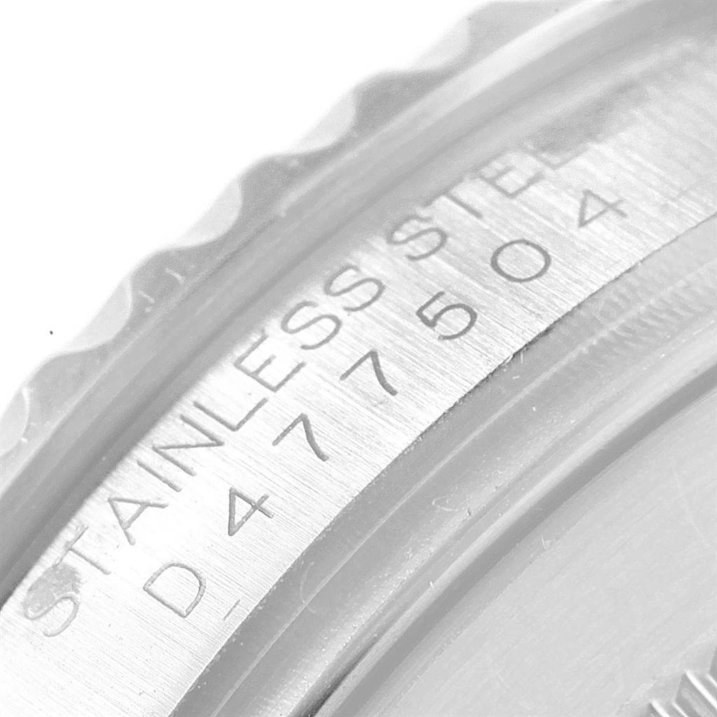 This close-up image shows the side engraving and bezel edge of a Rolex Yacht-Master 16622 Men's Stainless Steel Silver Dial 16622 Men's Stainless Steel Silver Dial watch, highlighting the stainless steel marking and serial number.