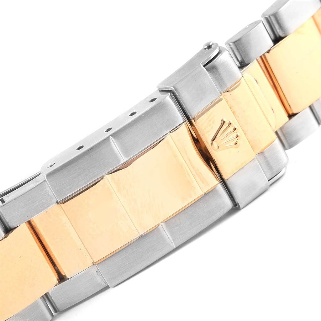 The image shows the clasp and part of the bracelet of a Rolex Yacht-Master 16623 Men's Stainless Steel Blue Dial 16623 Men's Stainless Steel Blue Dial watch, featuring a two-tone metal design.