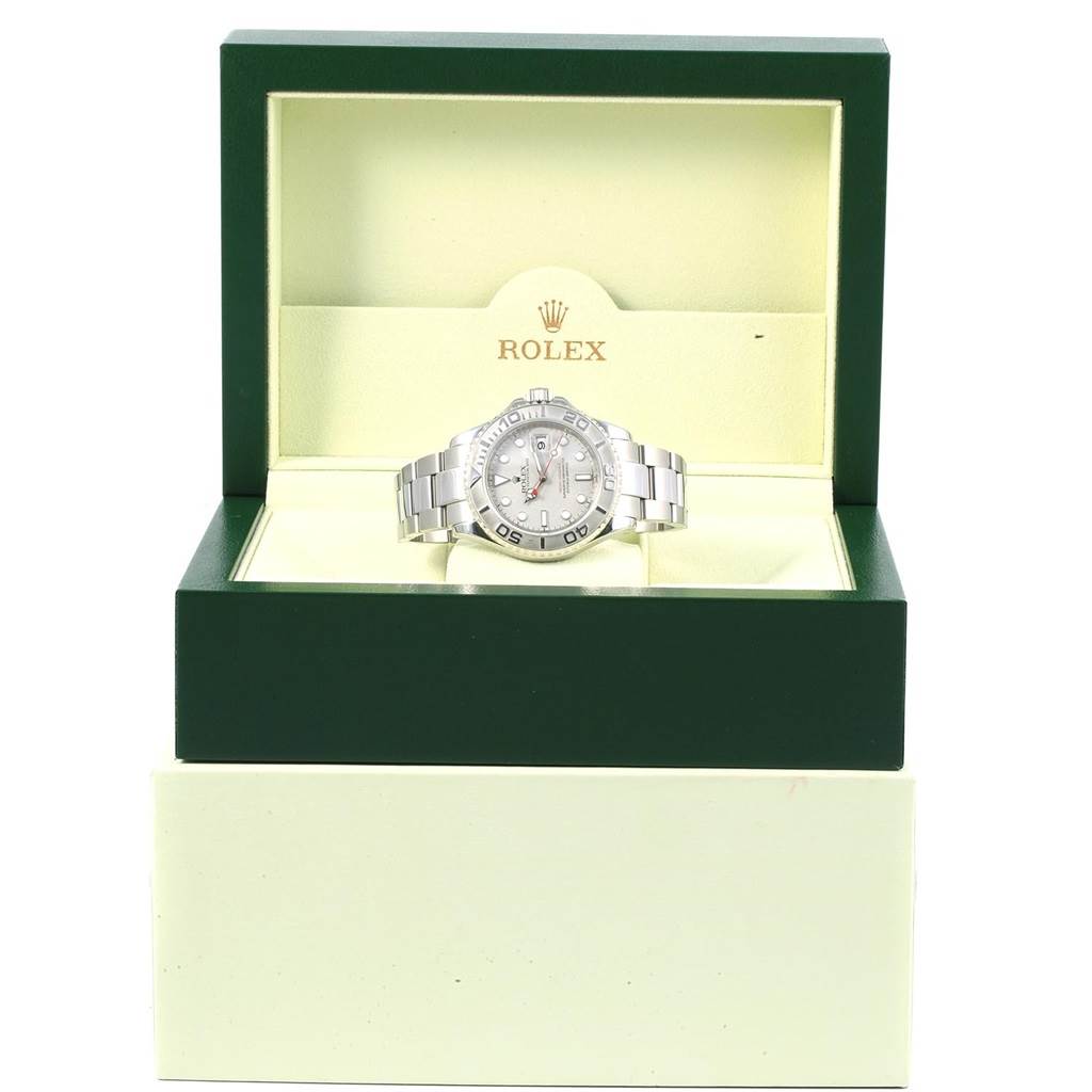 The image shows a Rolex Yacht-Master 16622 Men's Stainless Steel Silver Dial 16622 Men's Stainless Steel Silver Dial watch displayed inside its open green and cream box.