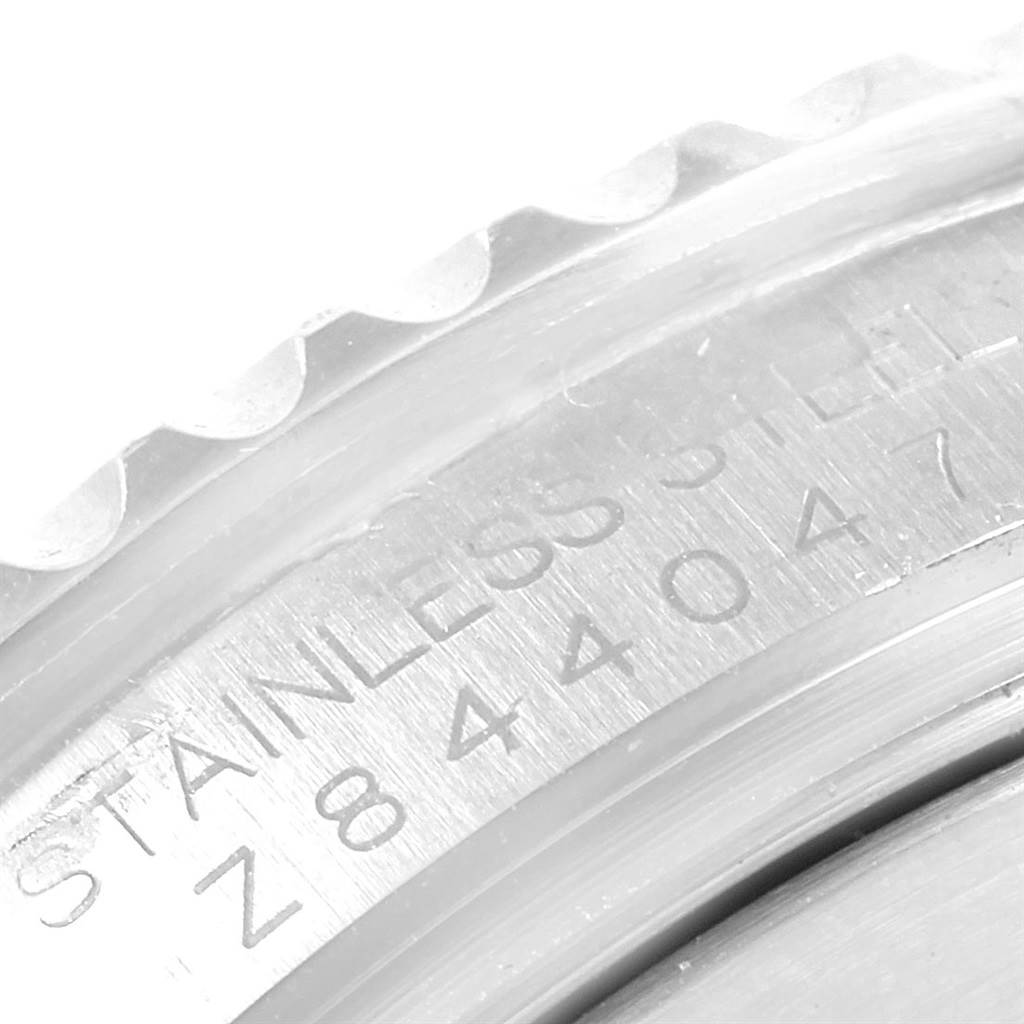 This image shows a close-up of the stainless steel bezel and engraving on a Rolex Yacht-Master 16622 Men's Stainless Steel Silver Dial 16622 Men's Stainless Steel Silver Dial watch.