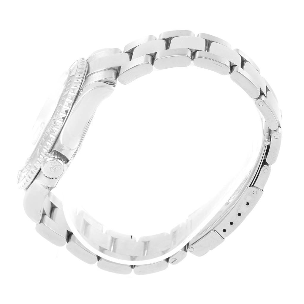 This side-angle view of the Rolex Yacht-Master 16622 Men's Stainless Steel Silver Dial 16622 Men's Stainless Steel Silver Dial watch displays its bracelet, clasp, and side profile of the case and crown.