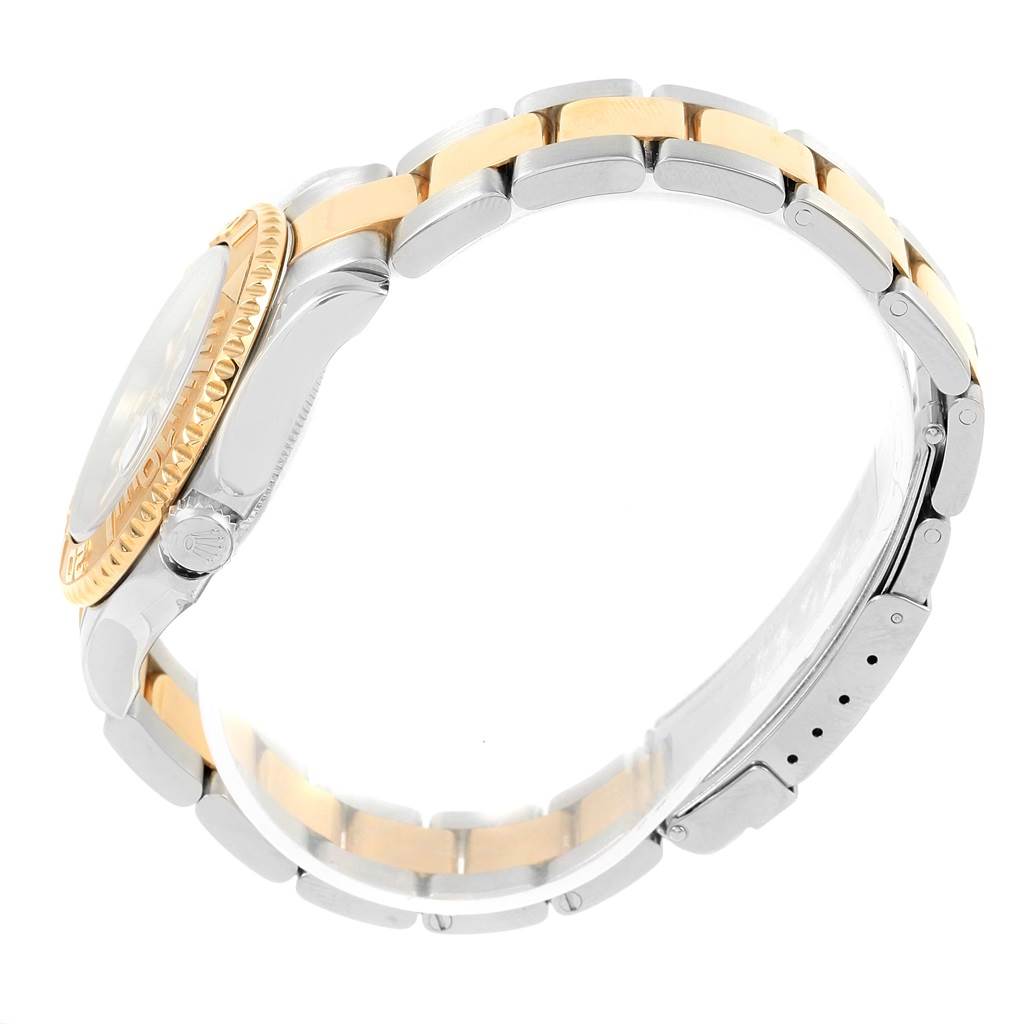 This image shows a side view of a Rolex Yacht-Master 168623 Men's Steel and Gold (two tone) Grey Dial 168623 Men's Steel and Gold (two tone) Grey Dial watch, focusing on the two-tone bracelet and bezel.