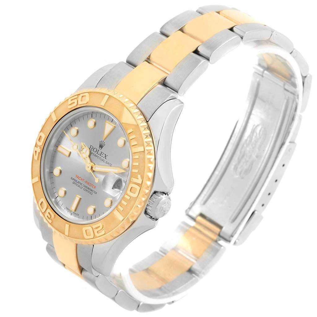 This image shows a Rolex Yacht-Master 168623 Men's Steel and Gold (two tone) Grey Dial 168623 Men's Steel and Gold (two tone) Grey Dial watch at an angle highlighting the face, bezel, and part of the bracelet with clasp.