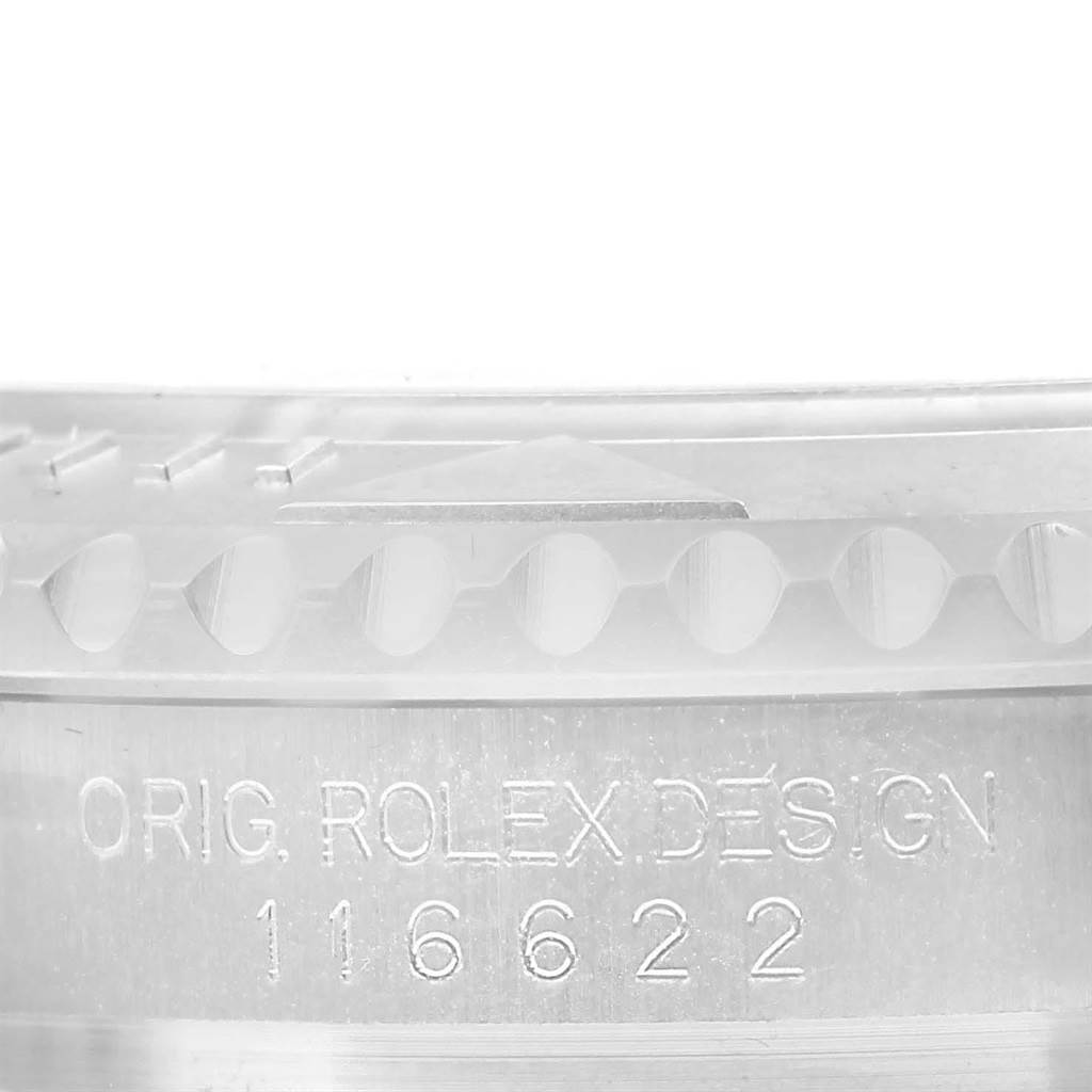 The image shows a close-up view of the engraving on the side of a Rolex Yacht-Master 116622 Men's Stainless Steel Silver Dial 116622 Men's Stainless Steel Silver Dial model 116622 bezel and case.