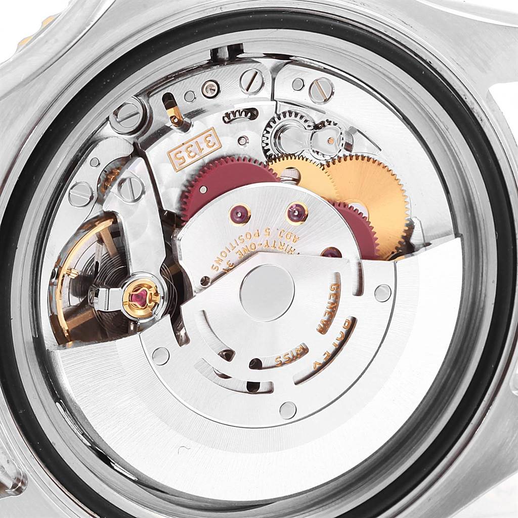 This image shows the internal mechanical movement of the Rolex Yacht-Master 16623 Men's Stainless Steel Champagne Dial 16623 Men's Stainless Steel Champagne Dial watch, highlighting gears and components in a close-up angle.