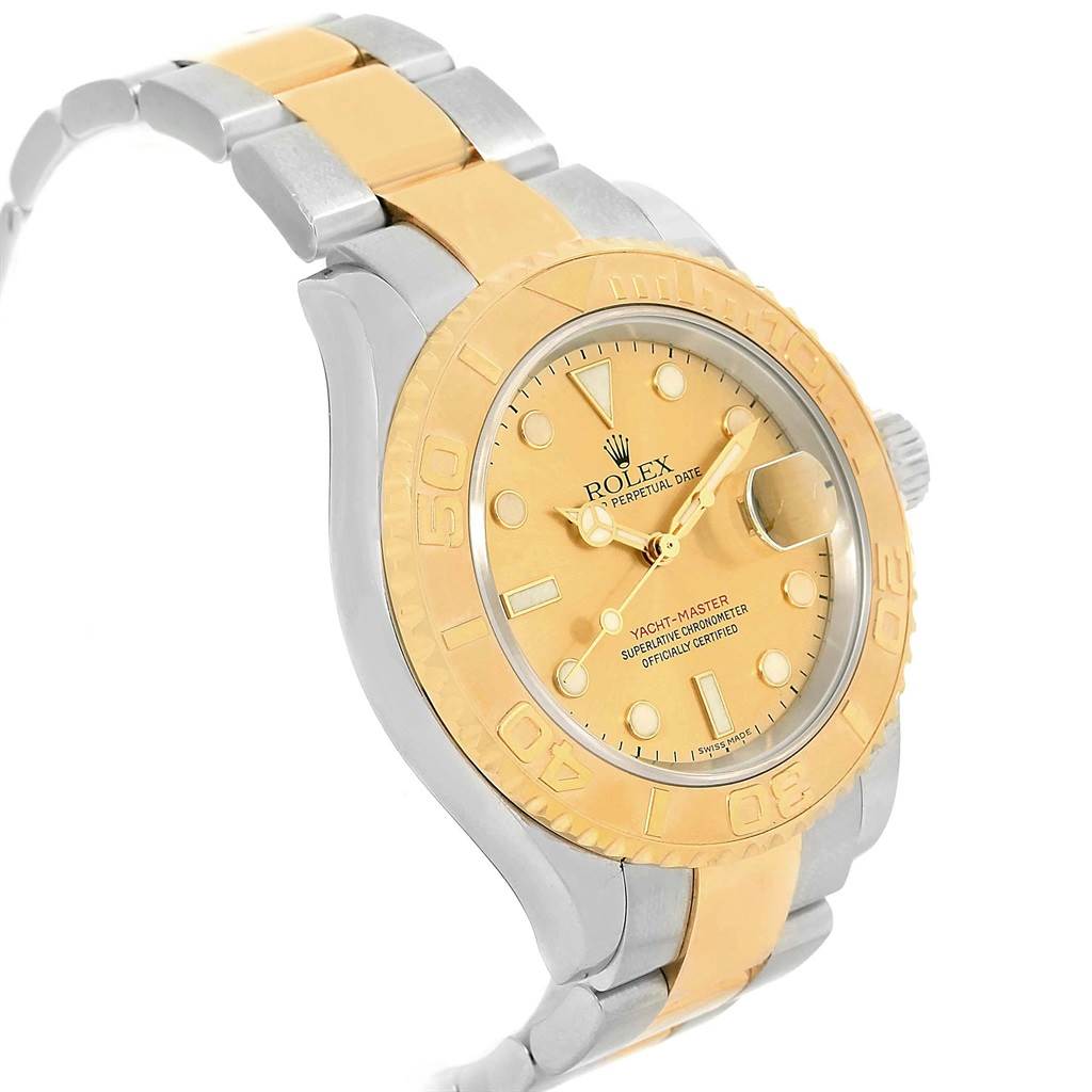 The Rolex Yacht-Master 16623 Men's Stainless Steel Champagne Dial 16623 Men's Stainless Steel Champagne Dial watch is shown at a slight angle, displaying its gold bezel, dial, and bi-metal bracelet.
