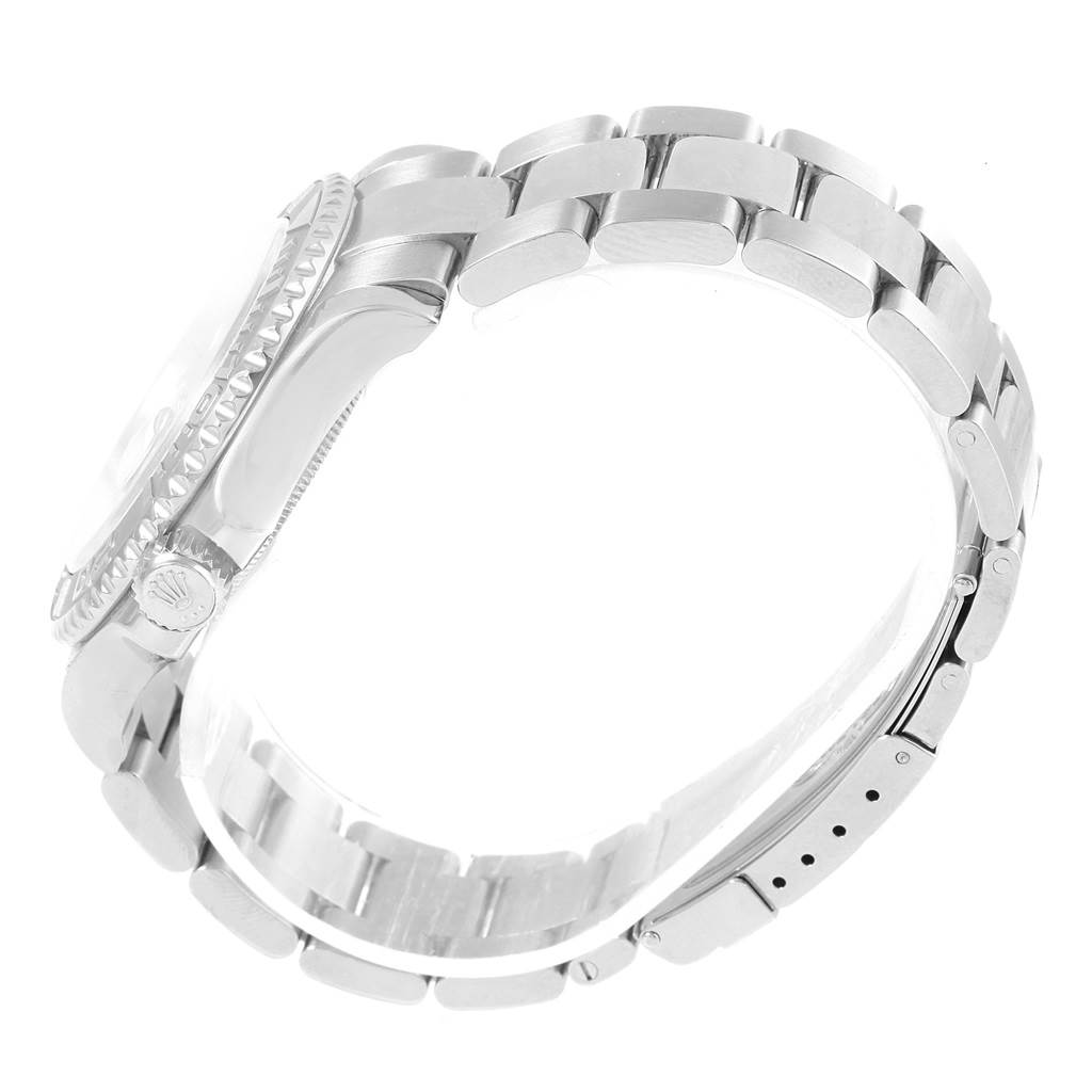 The image shows a side view of a Rolex Yacht-Master 16622 Men's Stainless Steel Silver Dial 16622 Men's Stainless Steel Silver Dial watch, highlighting the crown, bezel, and bracelet links.