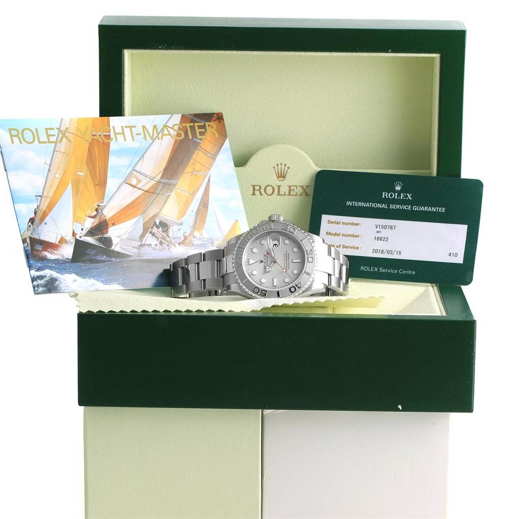 The Rolex Yacht-Master 16622 Men's Stainless Steel Silver Dial 16622 Men's Stainless Steel Silver Dial watch is displayed front-facing, accompanied by a card, booklet, and box.
