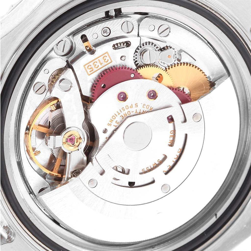 This image shows a close-up view of the Rolex Yacht-Master 16622 Men's Stainless Steel Silver Dial 16622 Men's Stainless Steel Silver Dial's internal mechanical movement from the back case angle.