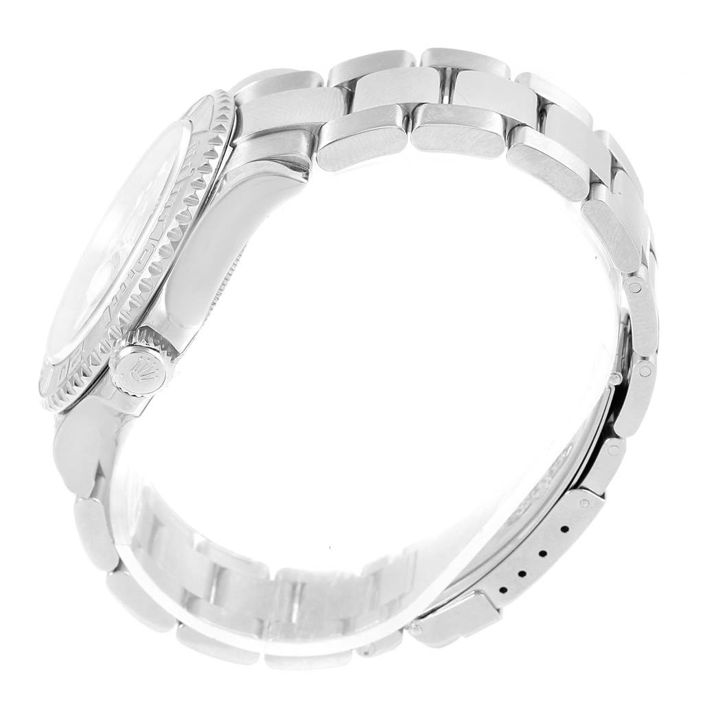 The Rolex Yacht-Master 16622 Men's Stainless Steel Silver Dial 16622 Men's Stainless Steel Silver Dial watch is shown from a side angle, highlighting the bezel, crown, and bracelet.