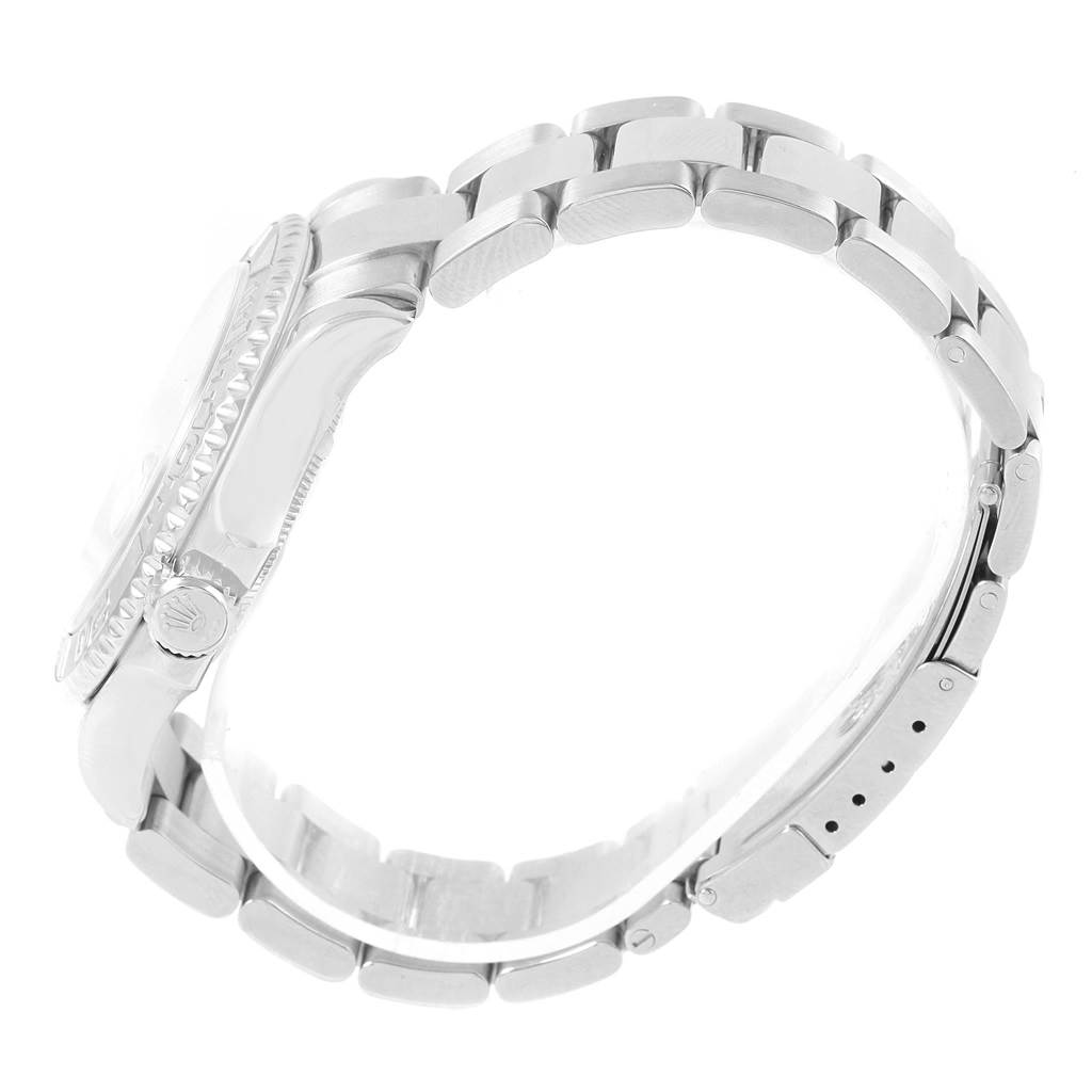 This side-view angle of the Rolex Yacht-Master 16622 Men's Stainless Steel Silver Dial 16622 Men's Stainless Steel Silver Dial watch shows the bracelet, crown, and part of the bezel.