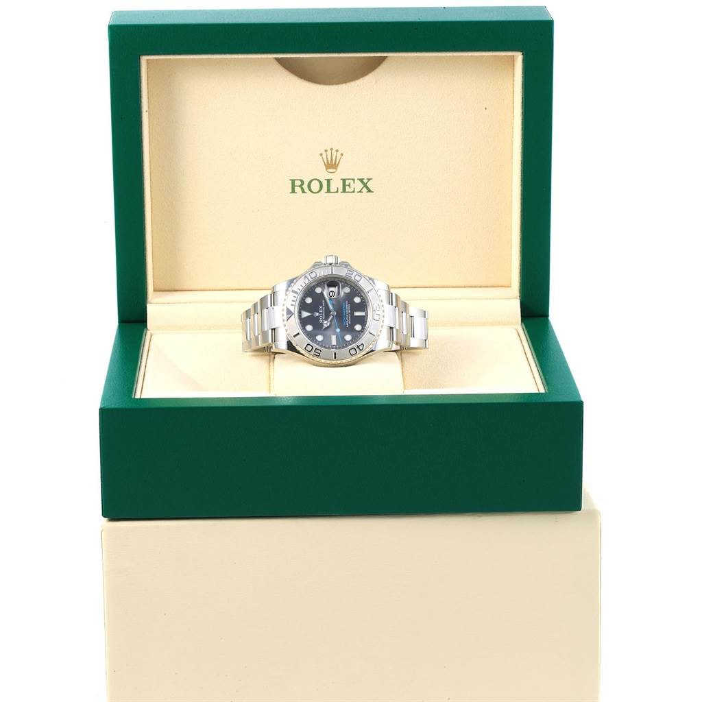 The Rolex Yacht-Master 116622 Men's Stainless Steel Grey Dial 116622 Men's Stainless Steel Grey Dial watch is displayed face-up in an open green and beige Rolex box.