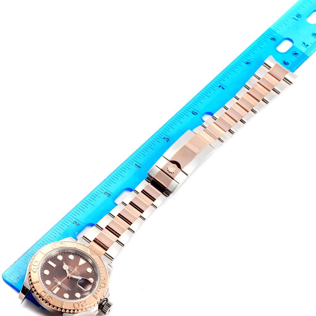 The Rolex Yacht-Master 116621 Men's Stainless Steel Brown Dial 116621 Men's Stainless Steel Brown Dial watch is shown from a top-down angle, displaying the face, bezel, dial, and bracelet.