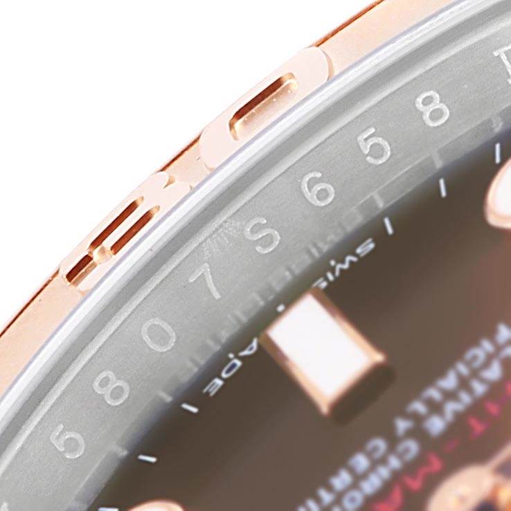 Close-up of the Rolex Yacht-Master 116621 Men's Stainless Steel Brown Dial 116621 Men's Stainless Steel Brown Dial watch, focusing on the bezel and partially visible face with numerical and notched detailing.
