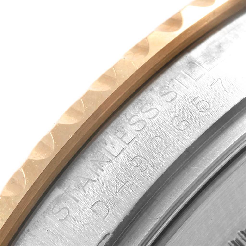 Close-up of the Rolex Yacht-Master 16623 Men's Stainless Steel Blue Dial 16623 Men's Stainless Steel Blue Dial model showing part of the bezel and engraved details on the stainless steel caseback.