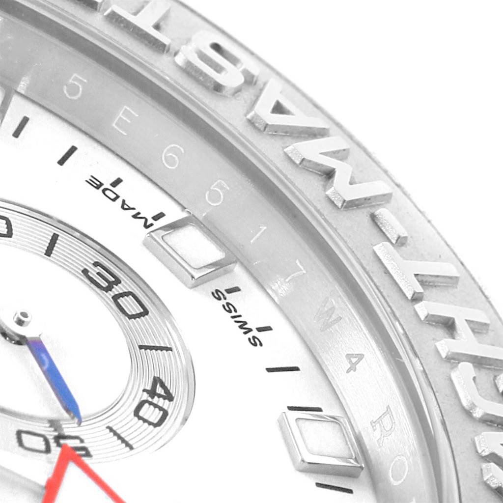 This is a close-up of the Rolex Yacht-Master 116689 Men's White Gold White Dial 116689 Men's White Gold White Dial watch, showing part of the bezel, dial, and markers.