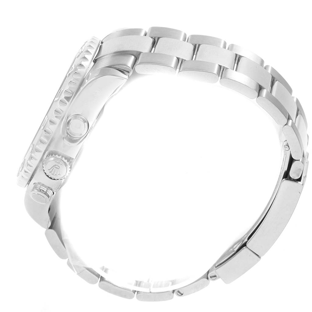 This image shows a side view of the Rolex Yacht-Master 116689 Men's White Gold White Dial 116689 Men's White Gold White Dial watch, featuring its bezel, crown, and bracelet.