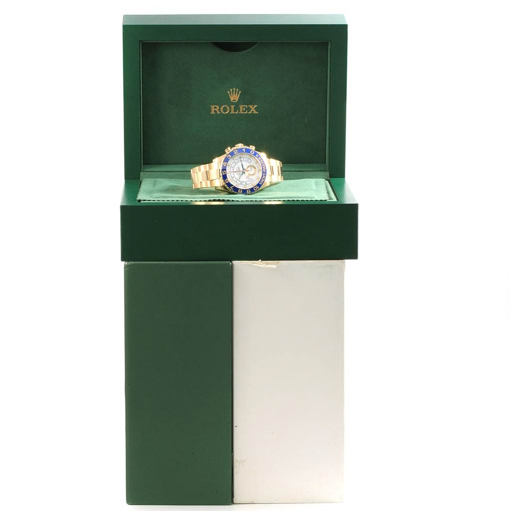 The Rolex Yacht-Master 116688 Men's Yellow Gold White Dial 116688 Men's Yellow Gold White Dial watch is displayed head-on inside an open green box.