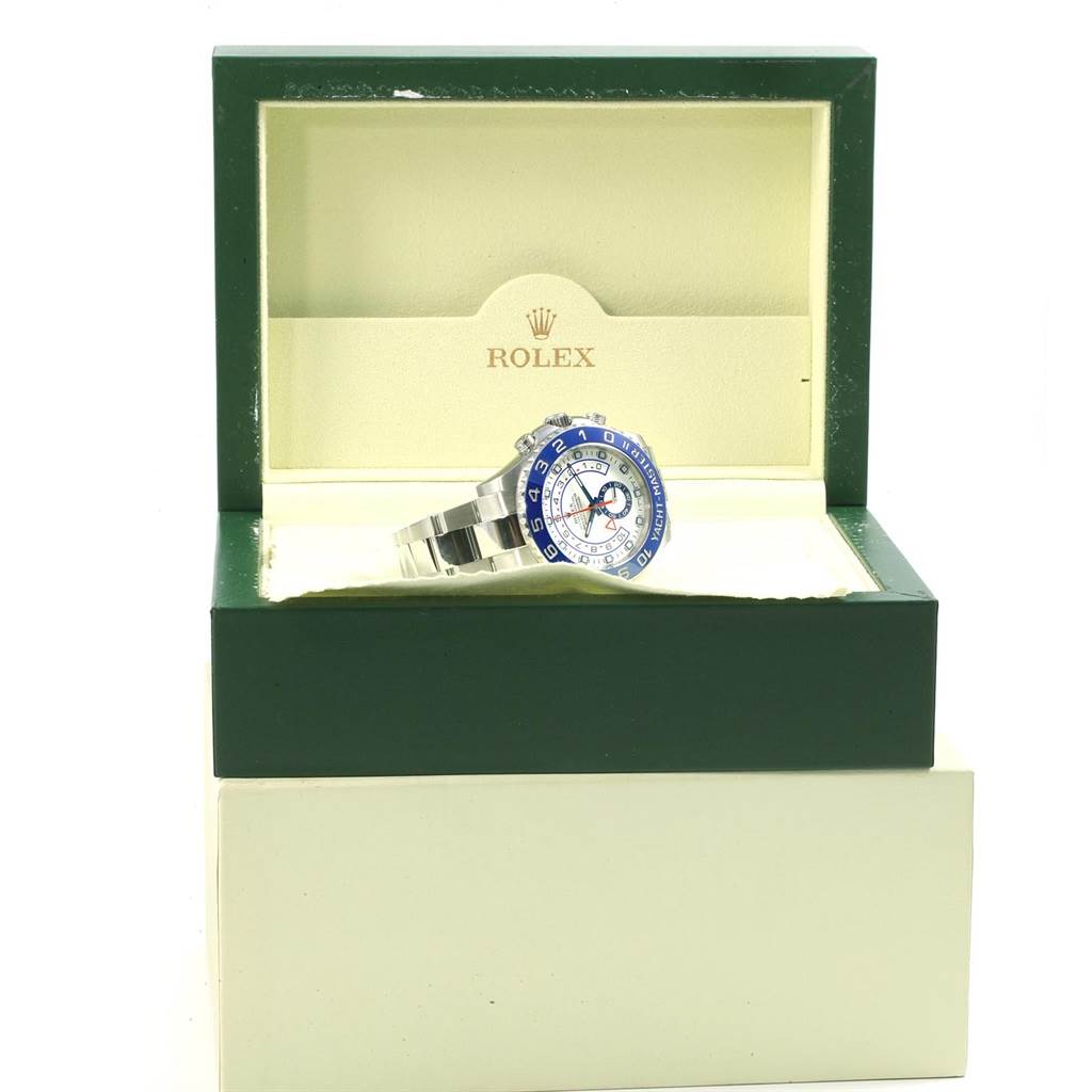 The Rolex Yacht-Master 116680 Men's Stainless Steel White Dial 116680 Men's Stainless Steel White Dial watch is displayed at an angle inside its green box, showcasing the face and part of the bracelet.