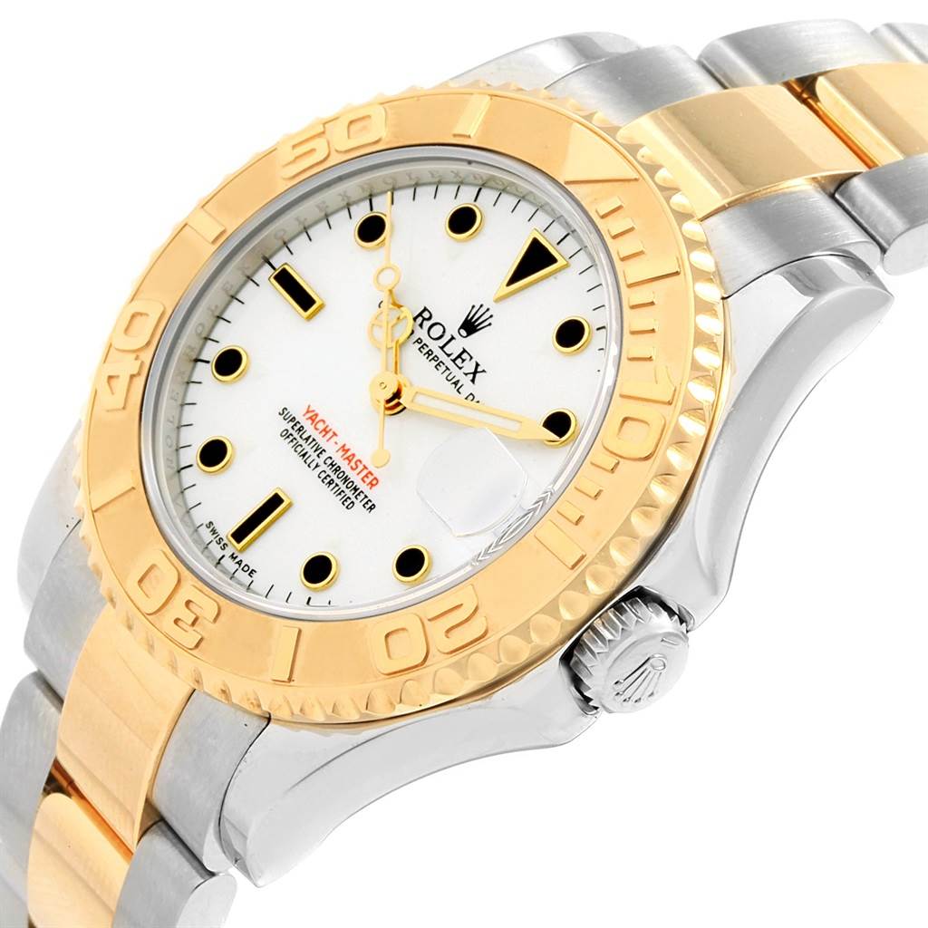 The image shows a close-up angle of the Rolex Yacht-Master 168623 Steel and Gold (two tone) White Dial 168623 Steel and Gold (two tone) White Dial watch, highlighting the dial, bezel, and part of the bracelet.