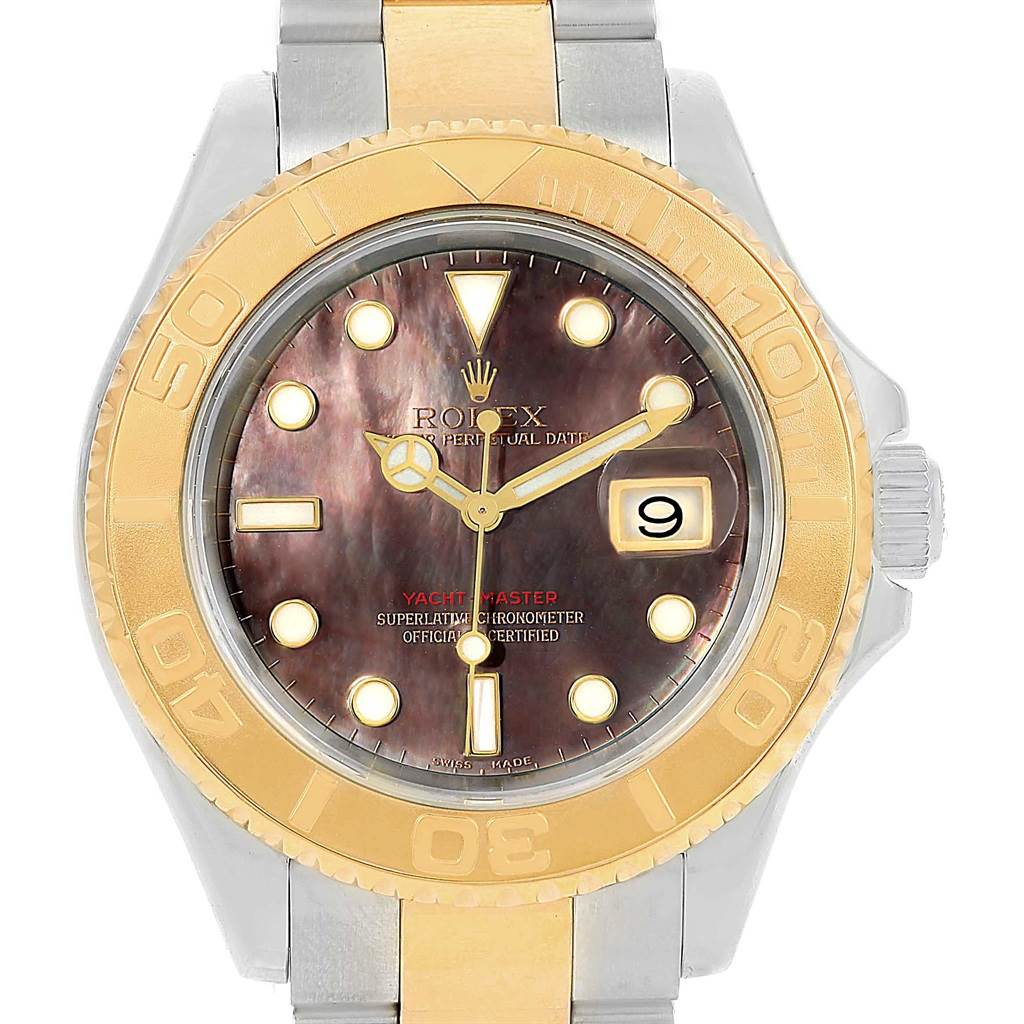 This Rolex Yacht-Master 16623 Men's Stainless Steel Mother of Pearl Dial 16623 Men's Stainless Steel Mother of Pearl Dial watch is shown from a front angle, highlighting its gold bezel, dark face, and metal bracelet.