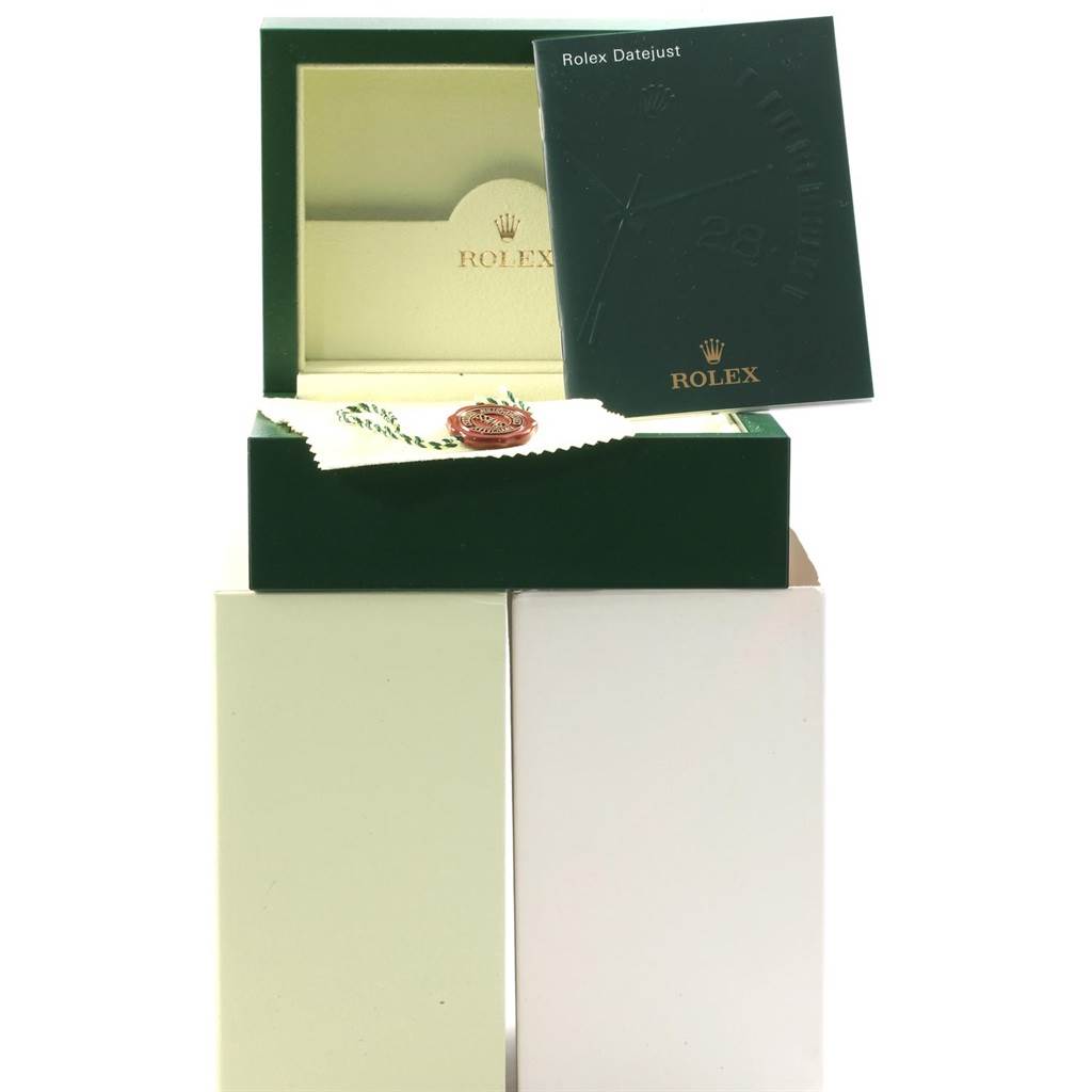 The image shows the green box, branding cards, tag, and cleaning cloth for a Rolex Yacht-Master 16623 Men's Stainless Steel White Dial 16623 Men's Stainless Steel White Dial.