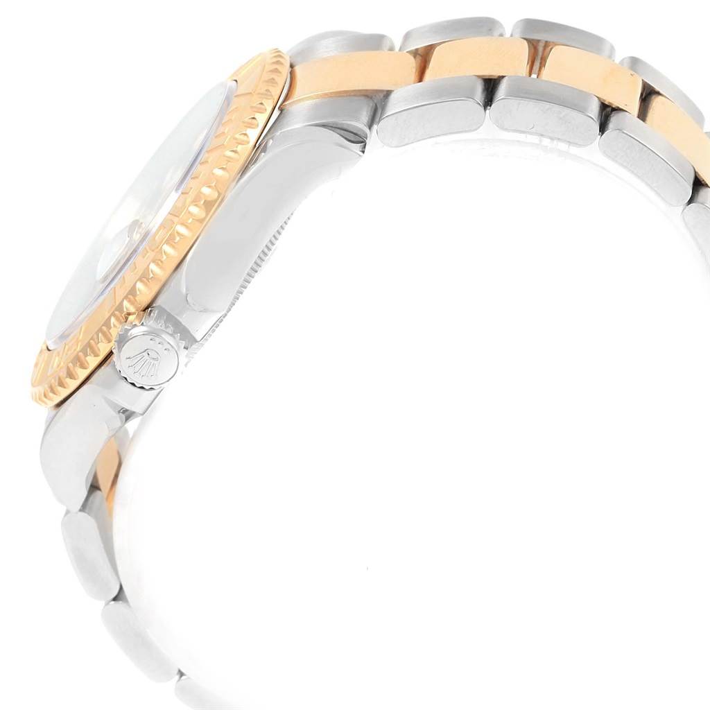 This image displays the side view of a Rolex Yacht-Master 16623 Men's Stainless Steel White Dial 16623 Men's Stainless Steel White Dial watch, highlighting its bezel, bracelet links, and the crown.