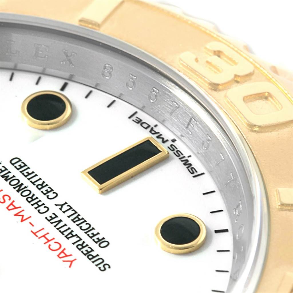 The image shows a close-up of the Rolex Yacht-Master 16623 Men's Stainless Steel White Dial 16623 Men's Stainless Steel White Dial watch dial, focusing on markers and text details.