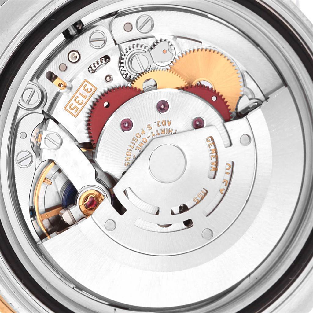This image shows the intricate internal mechanism and movement of a Rolex Yacht-Master 16623 Men's Stainless Steel White Dial 16623 Men's Stainless Steel White Dial watch from a close-up angle.