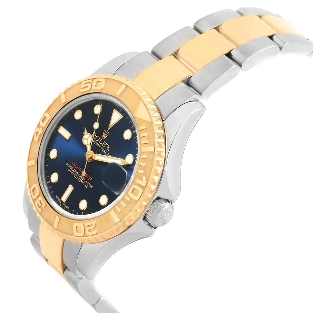 The Rolex Yacht-Master 168623 Men's Steel and Gold (two tone) Blue Dial 168623 Men's Steel and Gold (two tone) Blue Dial watch is shown at an angle displaying the face, bezel, and part of the two-tone bracelet.