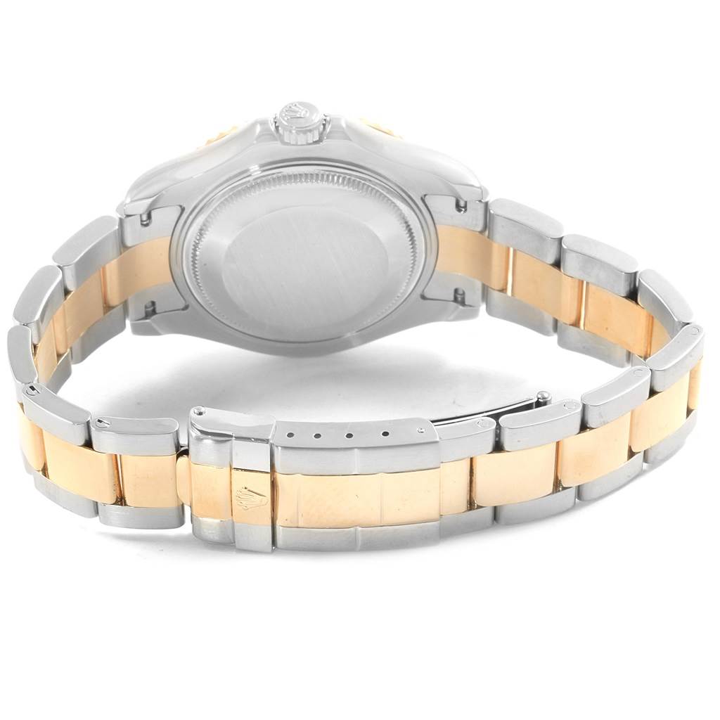 The image shows the back case and bracelet of a Rolex Yacht-Master 168623 Men's Steel and Gold (two tone) Blue Dial 168623 Men's Steel and Gold (two tone) Blue Dial watch at a slight top-down angle.