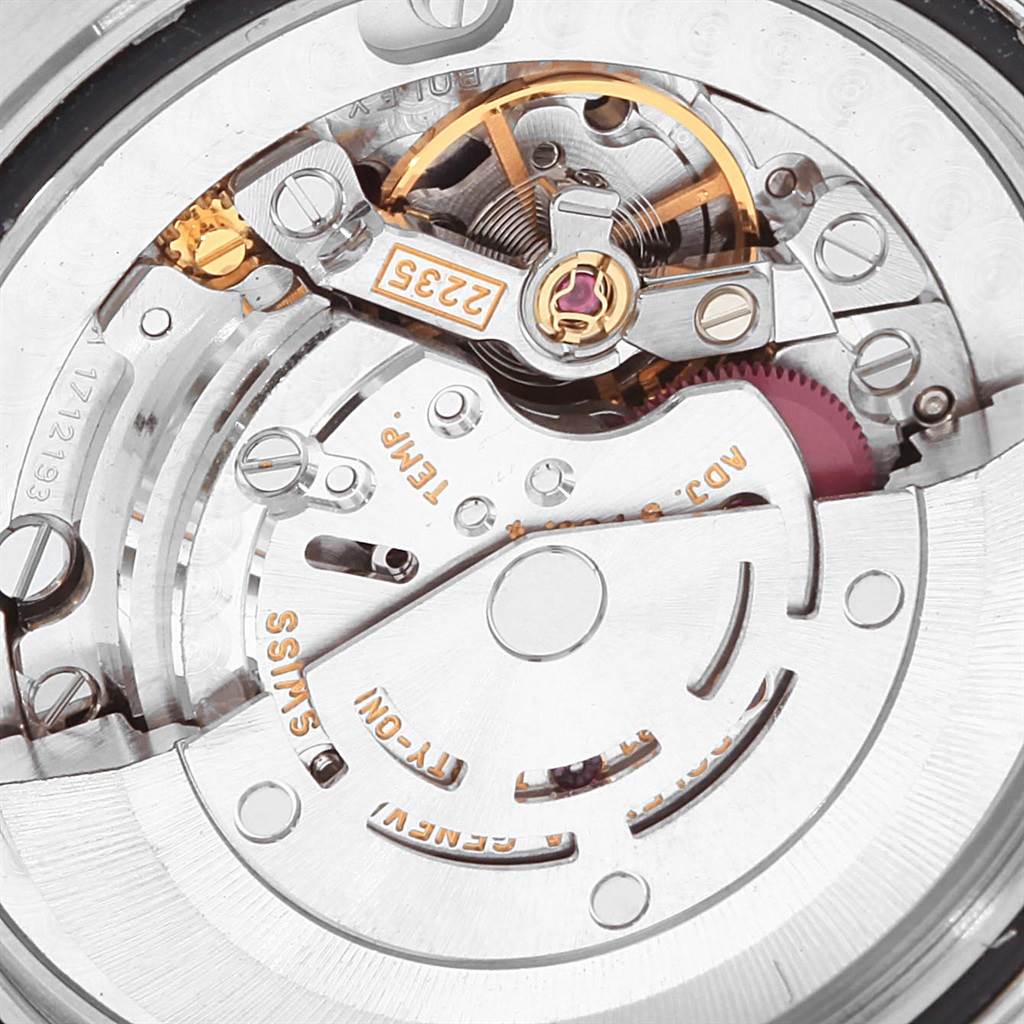 This image shows a detailed close-up of the movement mechanism inside a Rolex Yacht-Master 168623 Men's Steel and Gold (two tone) Grey Dial 168623 Men's Steel and Gold (two tone) Grey Dial watch.