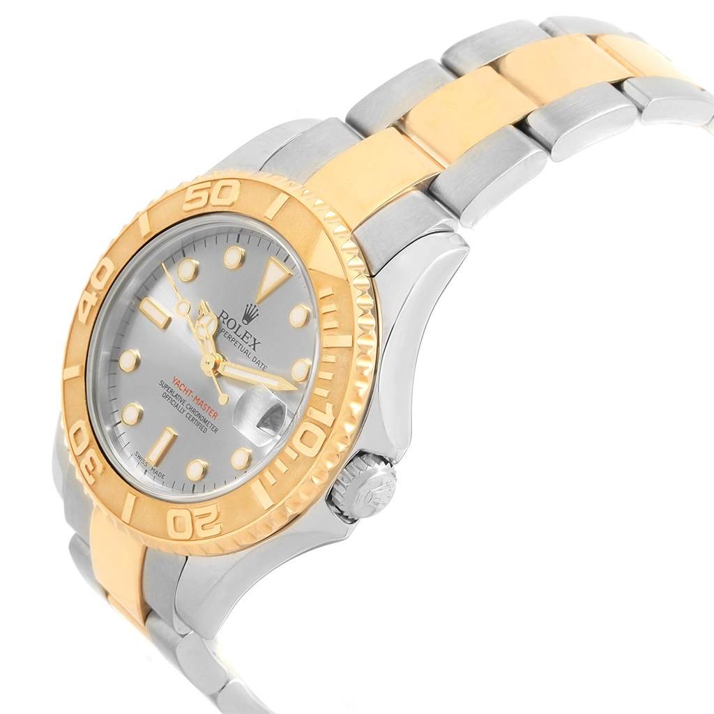 The image shows the front and side of a Rolex Yacht-Master 168623 Men's Steel and Gold (two tone) Grey Dial 168623 Men's Steel and Gold (two tone) Grey Dial watch, highlighting its bezel, dial, crown, and two-tone bracelet.