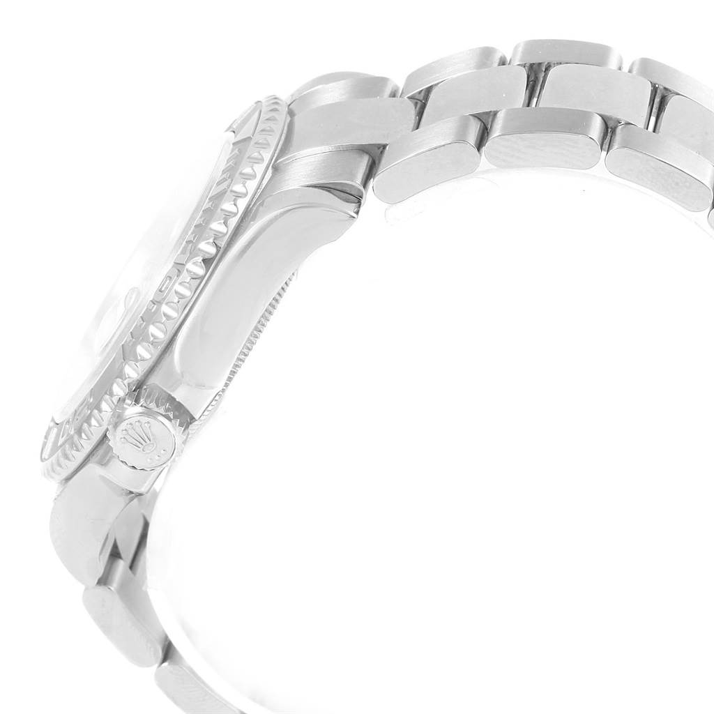 The image shows a side view of the Rolex Yacht-Master 16622 Men's Stainless Steel Silver Dial 16622 Men's Stainless Steel Silver Dial watch, highlighting the crown, bezel, and bracelet.