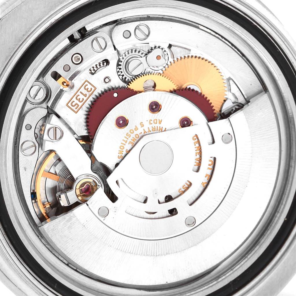 This image shows the internal mechanism of the Rolex Yacht-Master 16622 Men's Stainless Steel Silver Dial 16622 Men's Stainless Steel Silver Dial watch, focusing on its intricate gears and moving parts.