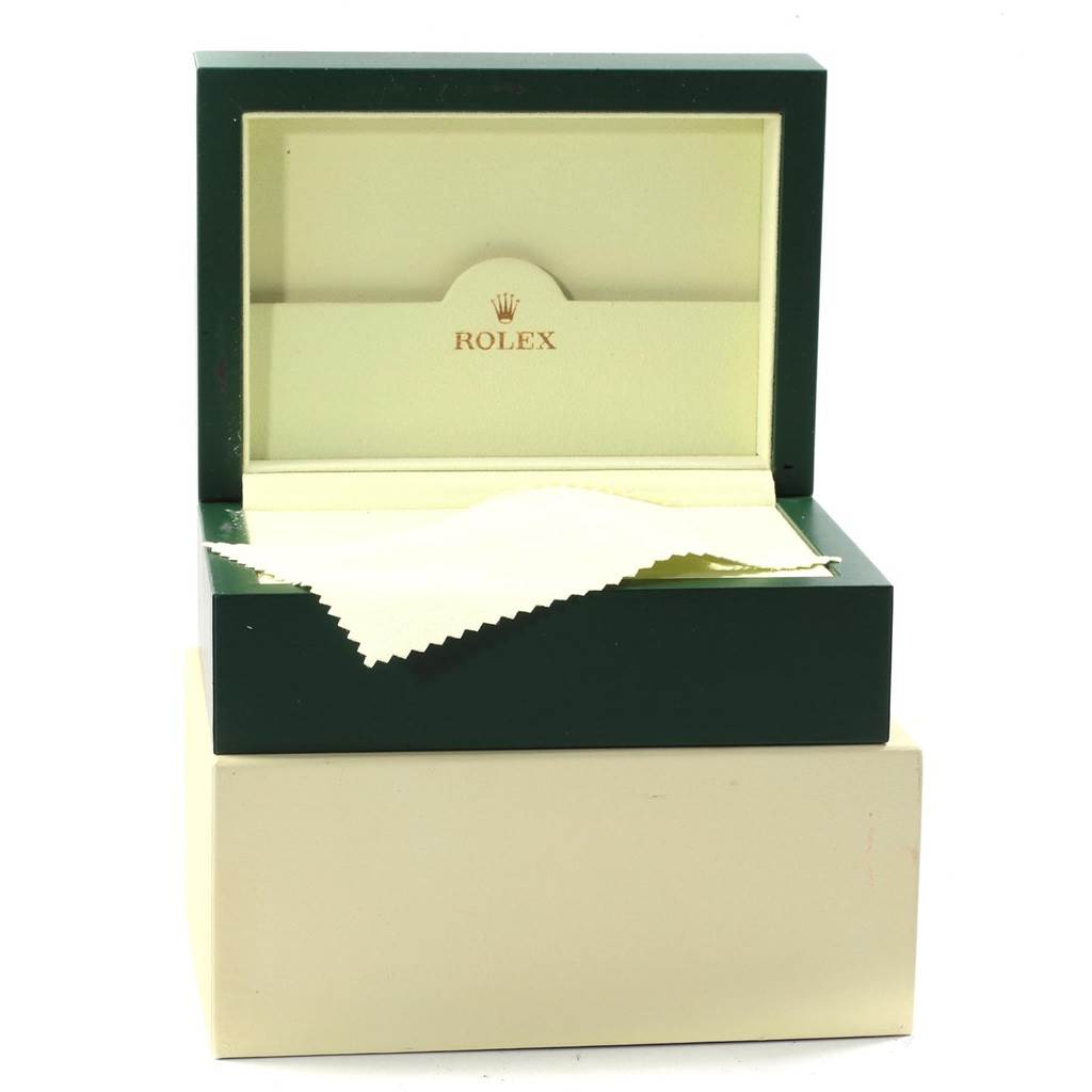 This image shows the open presentation box for a Rolex Yacht-Master 16623 Men's Stainless Steel White Dial 16623 Men's Stainless Steel White Dial watch, including the inner cushion and a cleaning cloth.