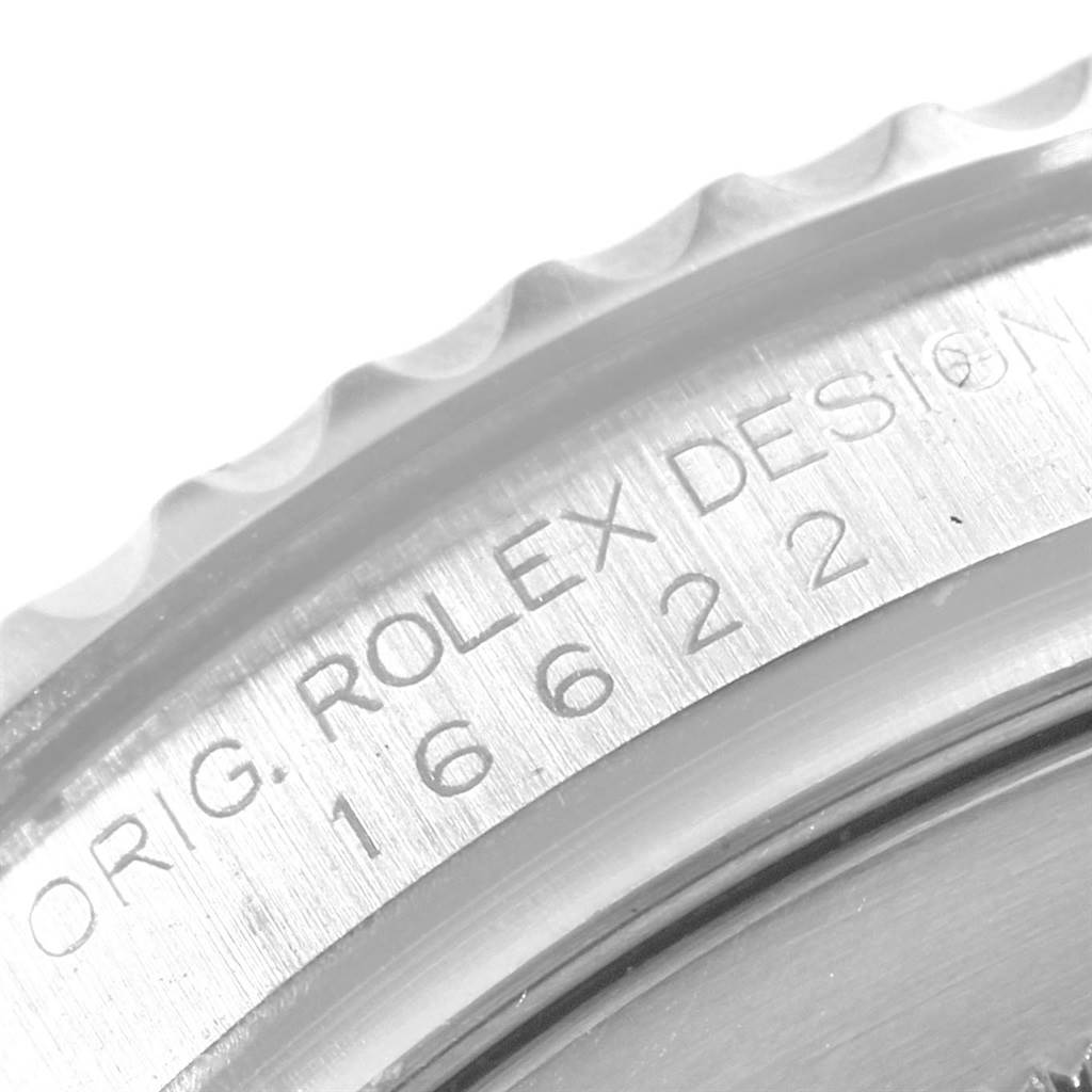 The image shows a close-up of the bezel and case edge of a Rolex Yacht-Master 16622 Men's Stainless Steel Silver Dial 16622 Men's Stainless Steel Silver Dial watch, displaying the engraved text and design number.