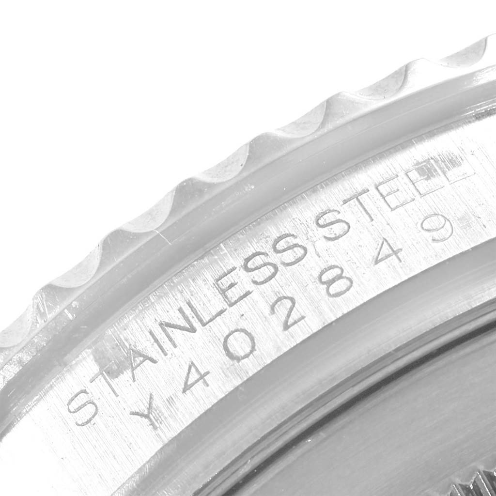 This image shows a close-up of the edge and serial number of a stainless steel Rolex Yacht-Master 16622 Men's Stainless Steel Silver Dial 16622 Men's Stainless Steel Silver Dial watch.