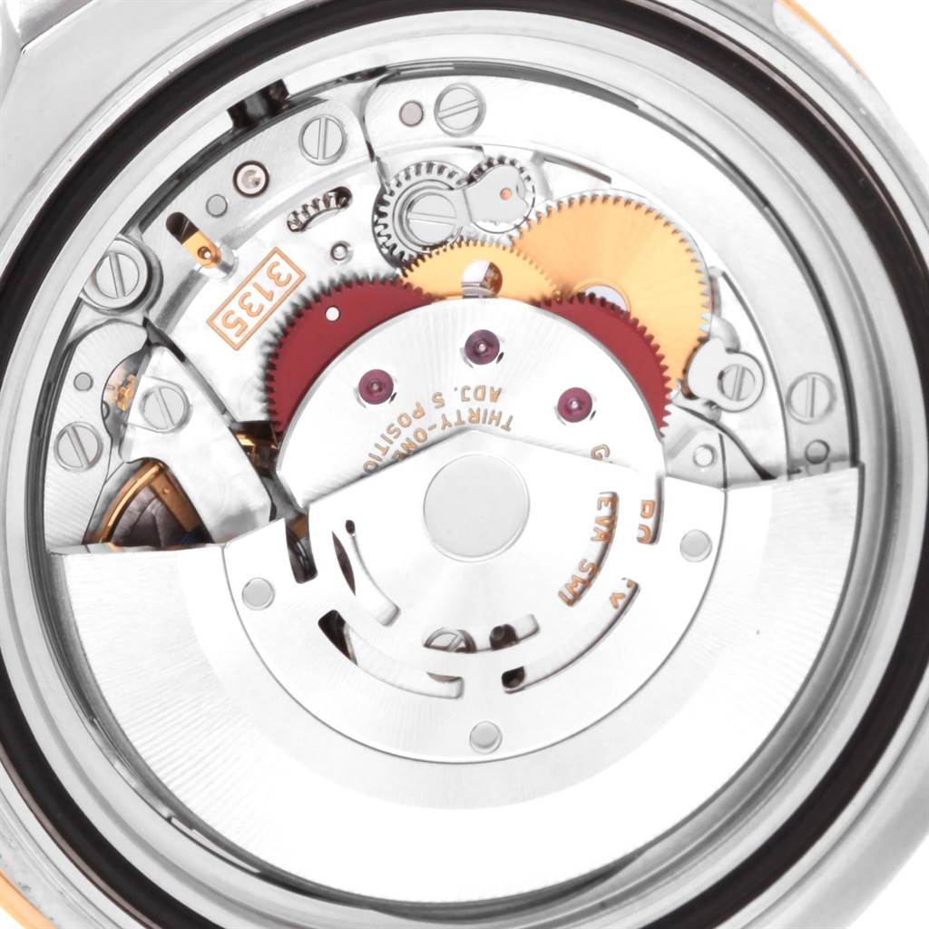 This image shows the intricate inner mechanical movement of a Rolex Yacht-Master 16623 Men's Stainless Steel Blue Dial 16623 Men's Stainless Steel Blue Dial watch from a backside angle.