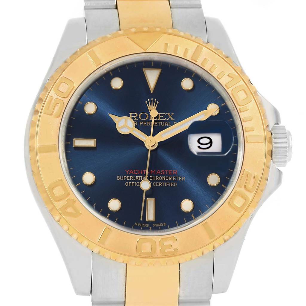 The image shows a front view of a Rolex Yacht-Master 16623 Men's Stainless Steel Blue Dial 16623 Men's Stainless Steel Blue Dial watch, highlighting its blue dial, gold bezel, and metal bracelet.
