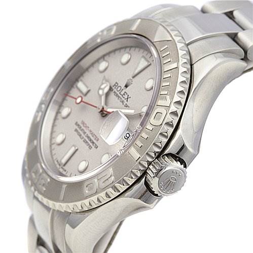 The image shows the side angle of a Rolex Yacht-Master 16622 Men's Stainless Steel Silver Dial 16622 Men's Stainless Steel Silver Dial watch, highlighting its bezel, crown, and a part of the bracelet.