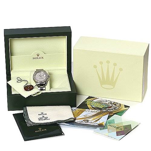 The image shows a Rolex Yacht-Master 16622 Men's Stainless Steel Silver Dial 16622 Men's Stainless Steel Silver Dial watch in its box, along with documentation, tags, and a cleaning cloth.
