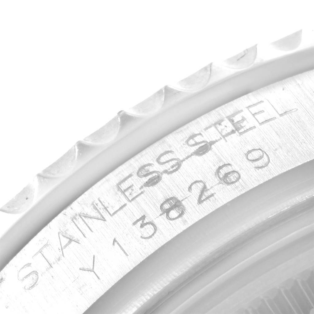 The image shows a close-up, angled view of the stainless steel bezel and serial number of the Rolex Yacht-Master 168622 Men's Stainless Steel Silver Dial 168622 Men's Stainless Steel Silver Dial watch.