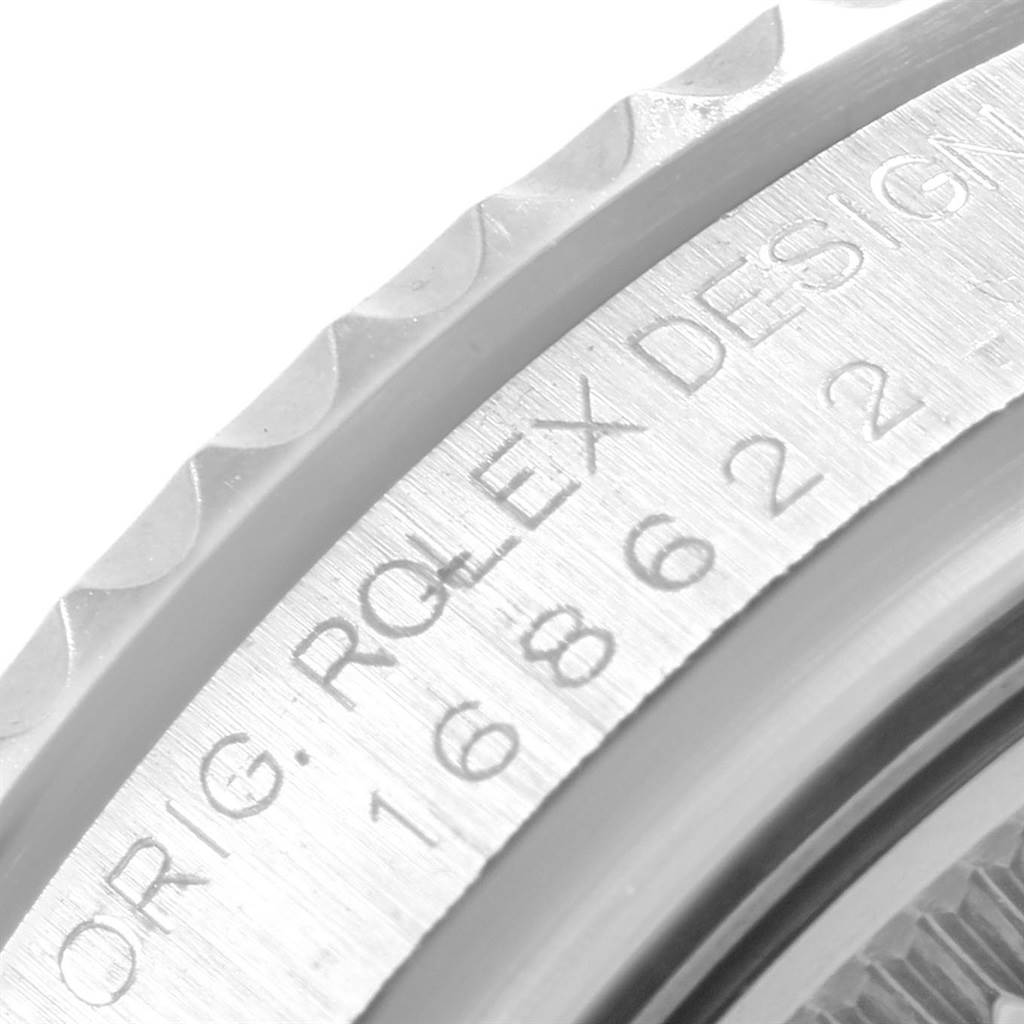 This close-up image shows the engraved case side and bezel edge of the Rolex Yacht-Master 168622 Men's Stainless Steel Silver Dial 168622 Men's Stainless Steel Silver Dial model watch.