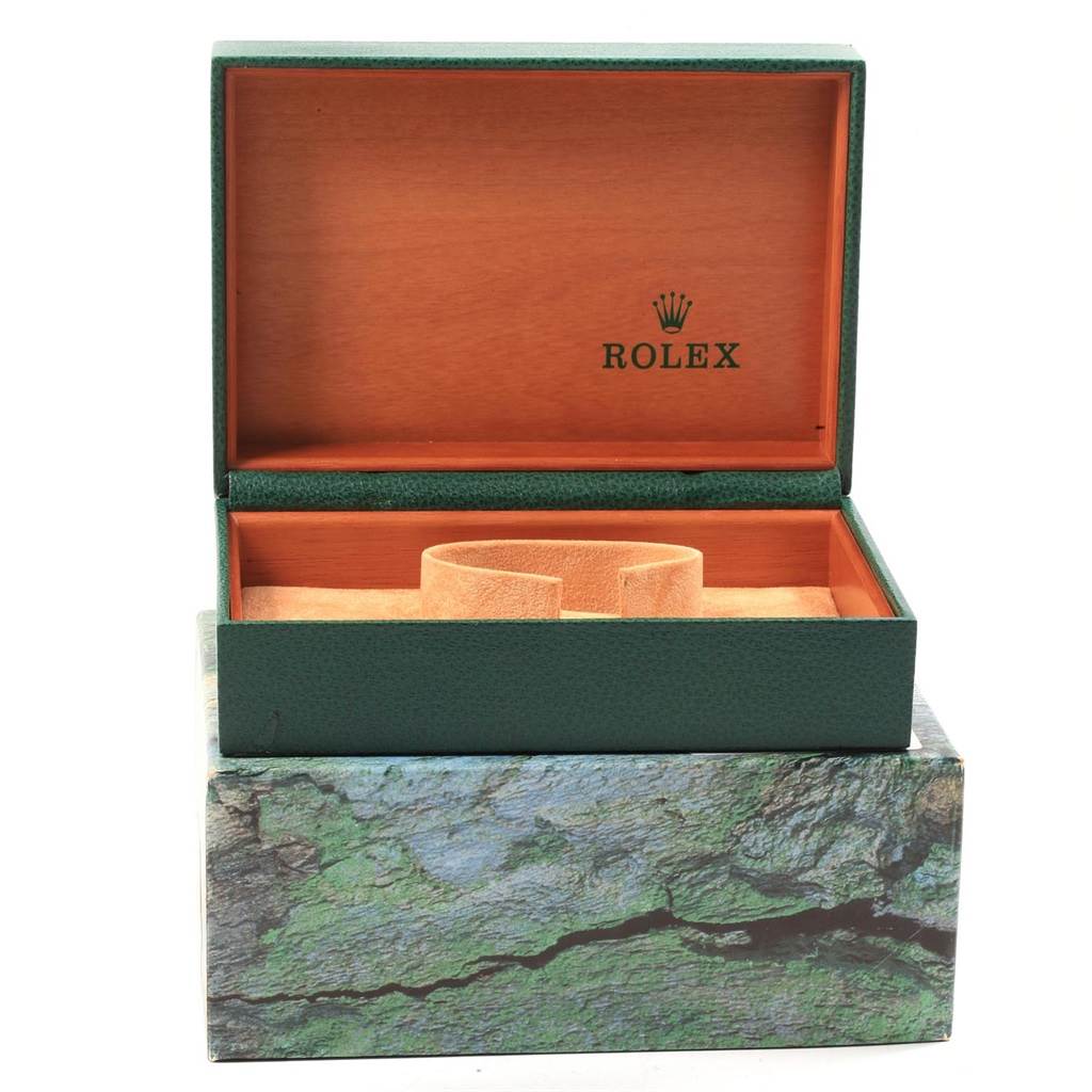 The image shows an open Rolex box for the Yacht-Master model, displaying the inner cushion and the brand logo.