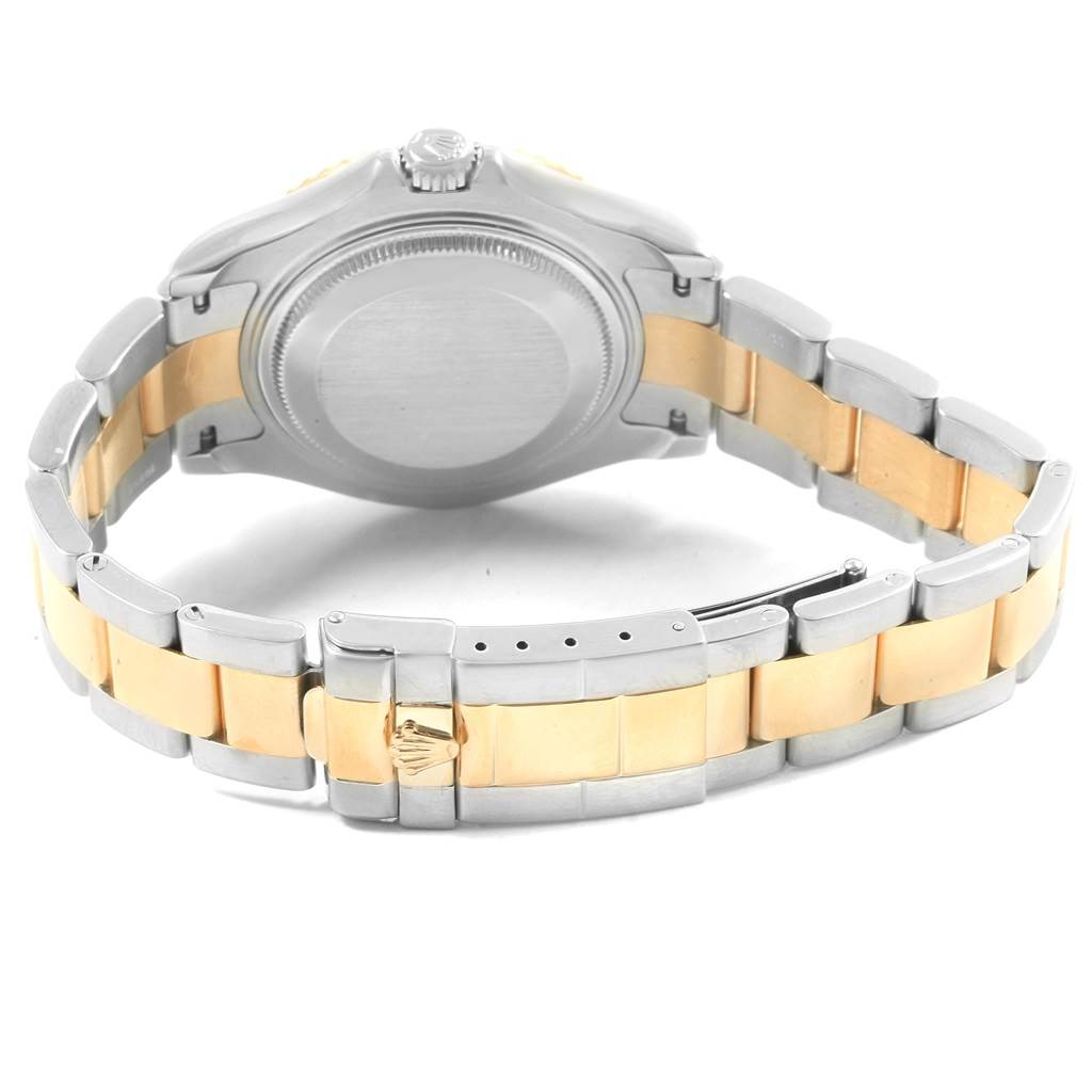 The photo shows the back case and bracelet of a Rolex Yacht-Master 168623 Men's Steel and Gold (two tone) Blue Dial 168623 Men's Steel and Gold (two tone) Blue Dial watch, emphasizing its two-tone metal design.